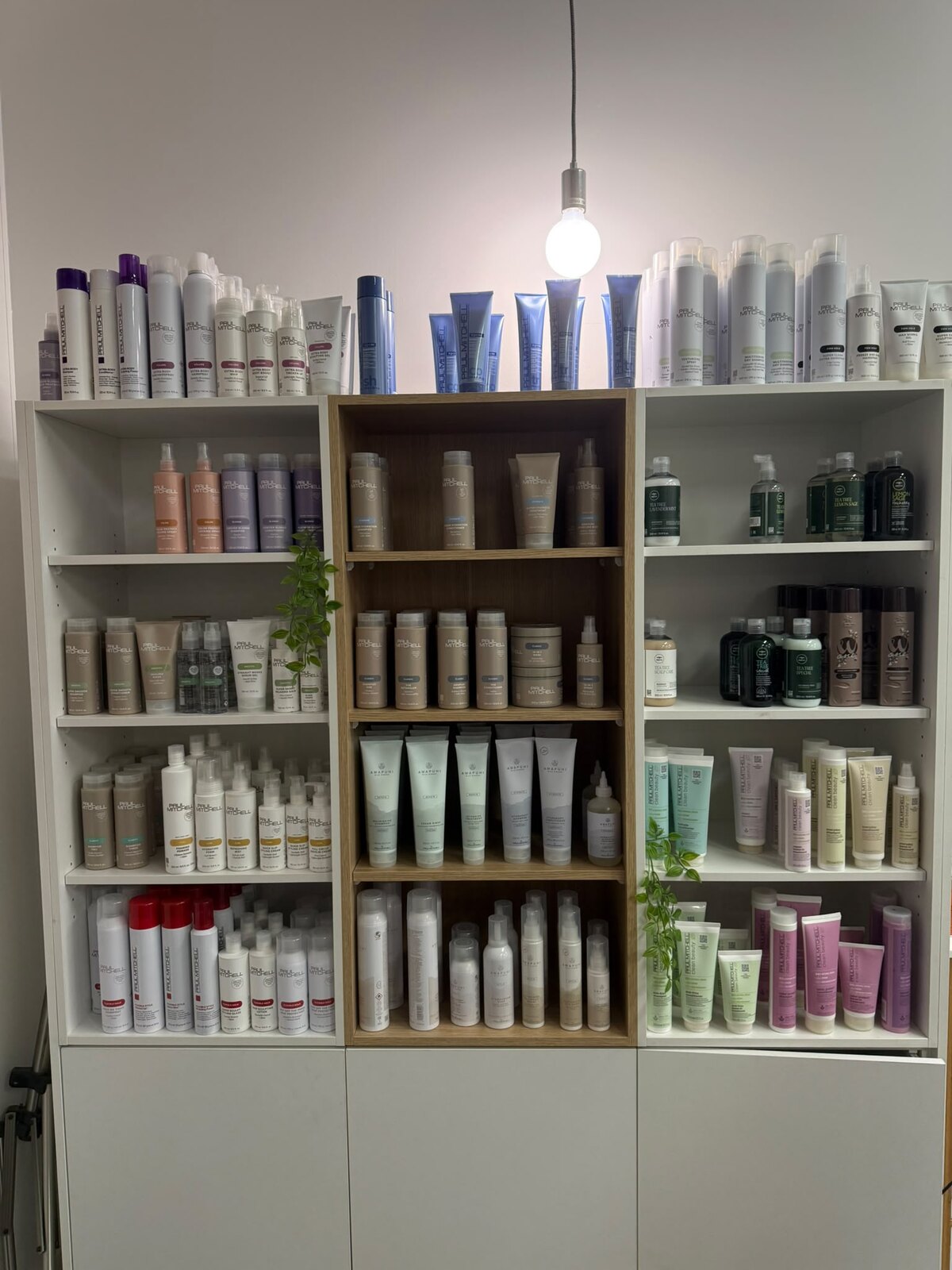 The organic product wall at Arty Hair Studio, Werribee