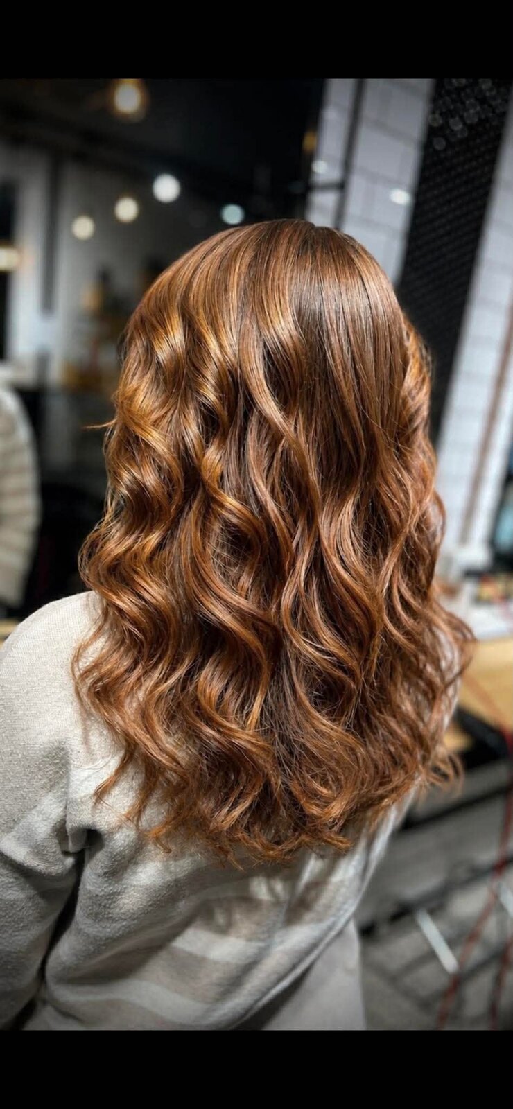 Copper waves styled by a Hair Station stylist